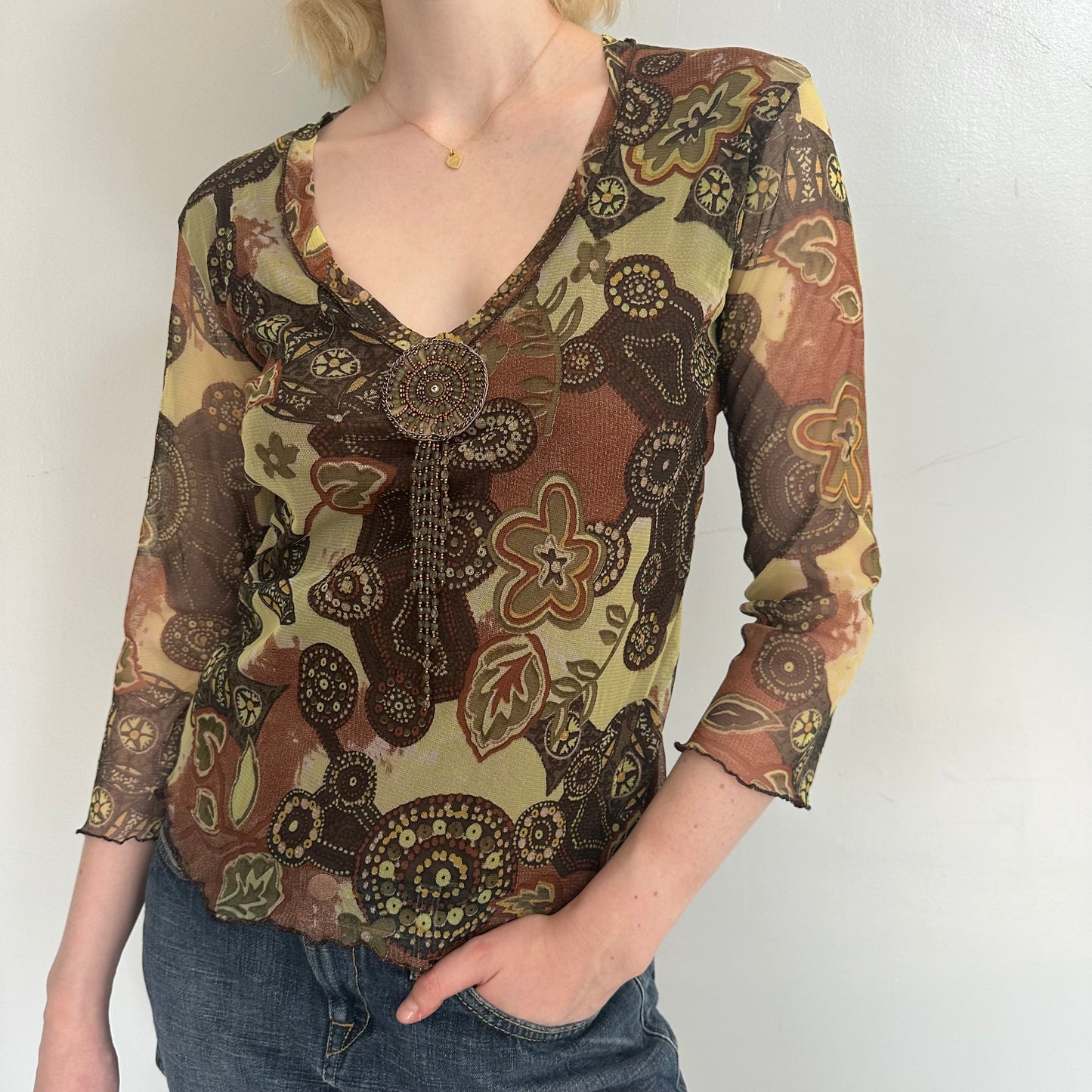 Floral beaded mesh top