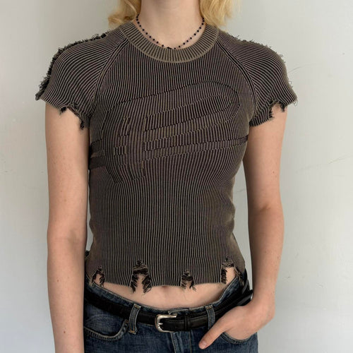 Distressed ribbed baby tee in washed brown featuring a fitted stretchy knit design, raw frayed hems, and vintage-inspired Y2K grunge aesthetic. Trendy indie sleaze women’s top styled with low rise jeans for a cool girl Pinterest outfit.