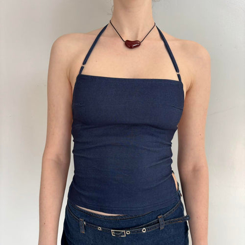 Navy blue Y2K halter top with adjustable straps, fitted backless tank top on model, minimalist aesthetic summer outfit, stretchy polyester cropped halter top paired with low-rise denim jeans, trendy going out top for women