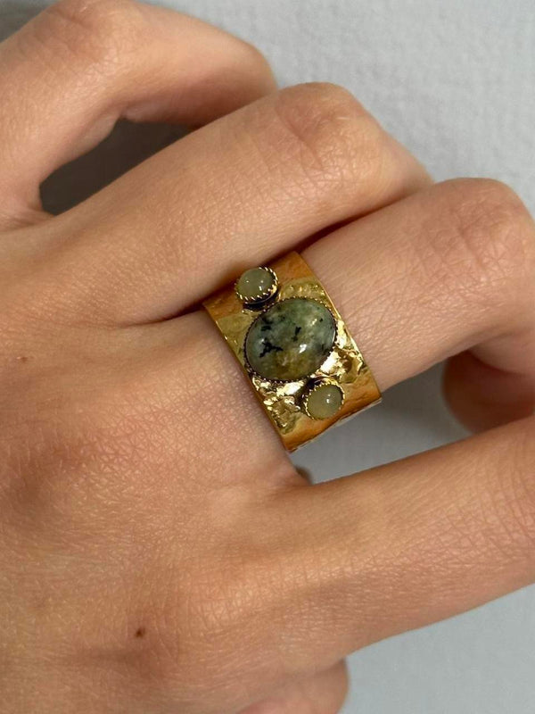 Gold adjustable statement ring with natural green stone detail, vintage-inspired boho jewelry, 14k gold plated waterproof hypoallergenic ring, trendy Y2K gemstone band styled on hand, tarnish-free everyday fashion accessory for women
