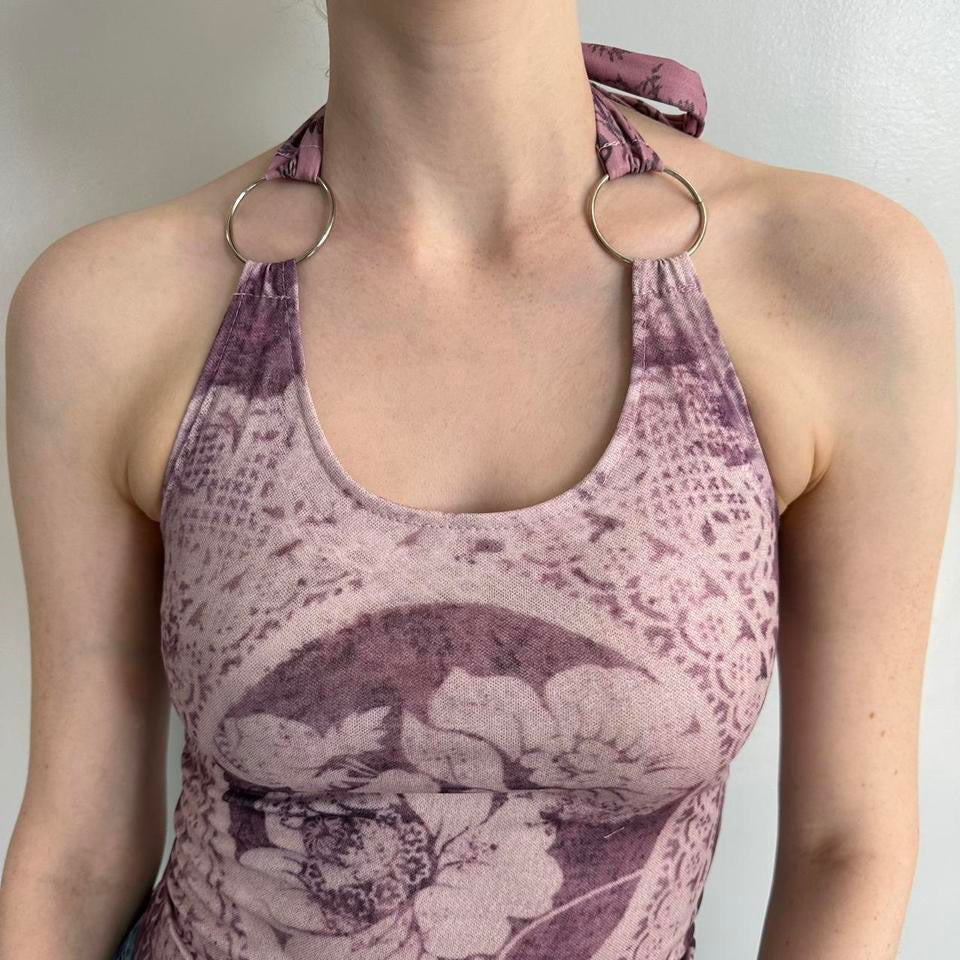 Close-up of pink floral halter top with silver ring shoulder details and vintage-inspired lace print. Soft girl Y2K aesthetic tank top featuring feminine coquette fashion, fitted stretchy polyester fabric, and romantic fairycore style. Trendy pink going out top perfect for summer outfits, Pinterest-inspired fashion, and everyday streetwear looks.