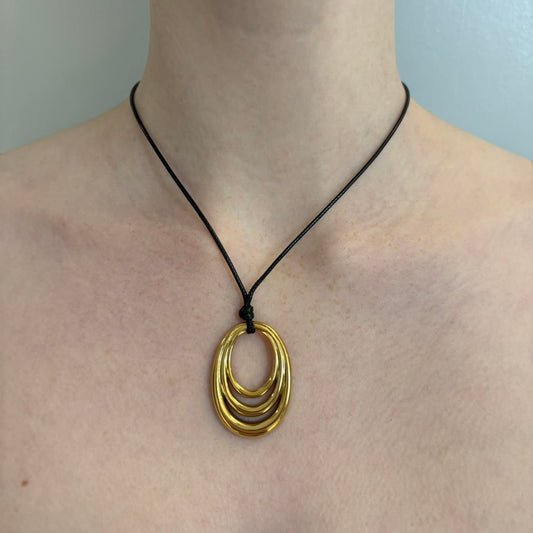 Gold oval pendant necklace