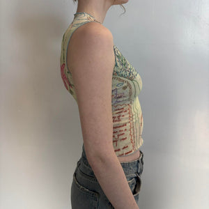 Side view of sheer butterfly mesh top, Y2K aesthetic sleeveless graphic tank, vintage inspired slim fit mesh shirt, abstract print polyester top, stretchy bodycon going out top, women’s trendy aesthetic clothing, Nuestro Amor Selectivos boutique style