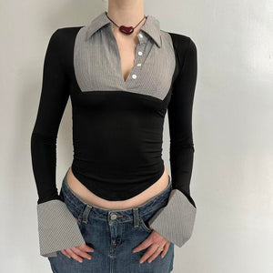 Black and grey office siren contrast collared top for women with long sleeves, fitted stretchy Y2K crop top, corporate chic blouse with pointed hem and oversized cuffs, trendy boutique fashion top paired with low rise denim mini skirt.